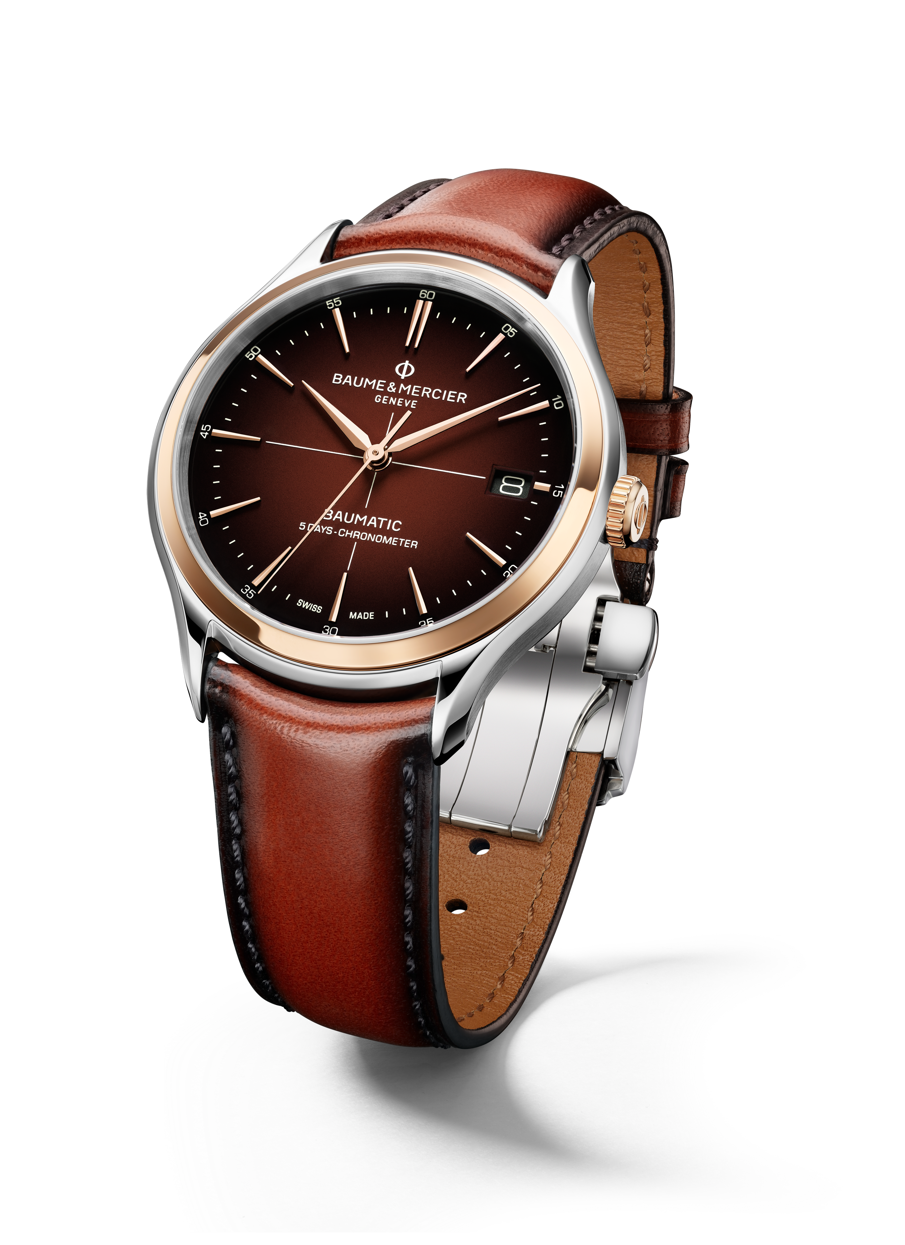 Eine braune Armbanduhr mit braunem Lederarmband und silbernem Gehäuse mit goldenem Ring. Das Zifferblatt ist braun.