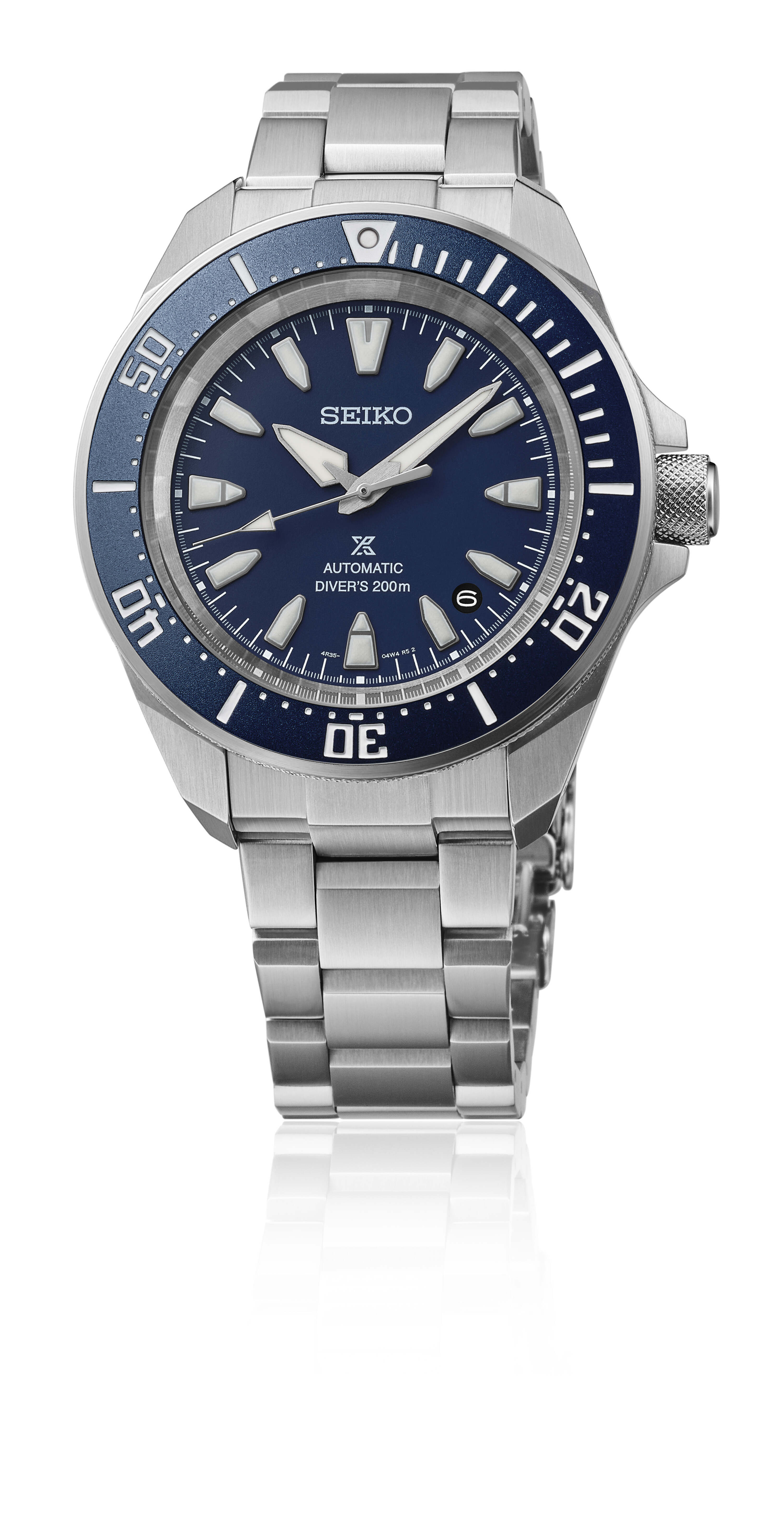 Eine silberne Taucheruhr mit einem tiefblauen Zifferblatt und einer silbernen Lünette.