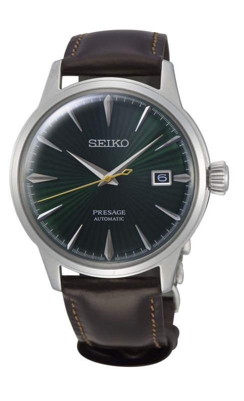 Eine elegante Seiko Presage Automatik Herrenuhr mit einem dunkelgrünen Sonnenstrahl-Zifferblatt und einem braunen Lederarmband.