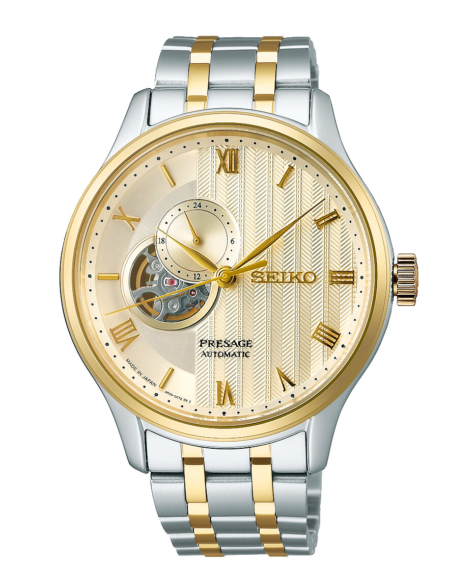 Seiko Presage Automatik Gold Uhr mit goldfarbenem Zifferblatt und silberfarbenen sowie goldfarbenen Armbandsegmenten.