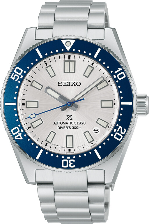 Die Seiko Prospex Automatik Diver 145th Anniversary Limited Edition ist eine auffällige Armbanduhr mit einem silbernen Zifferblatt, einer blauen Drehlünette und einem Edelstahlarmband.