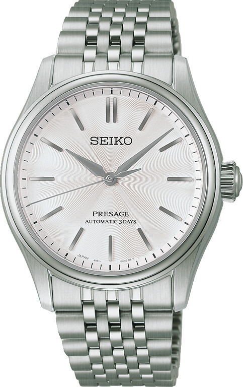 Eine klassische Seiko Presage Herrenuhr mit einem auffälligen silbernen Zifferblatt und einem eleganten silbernen Armband.
