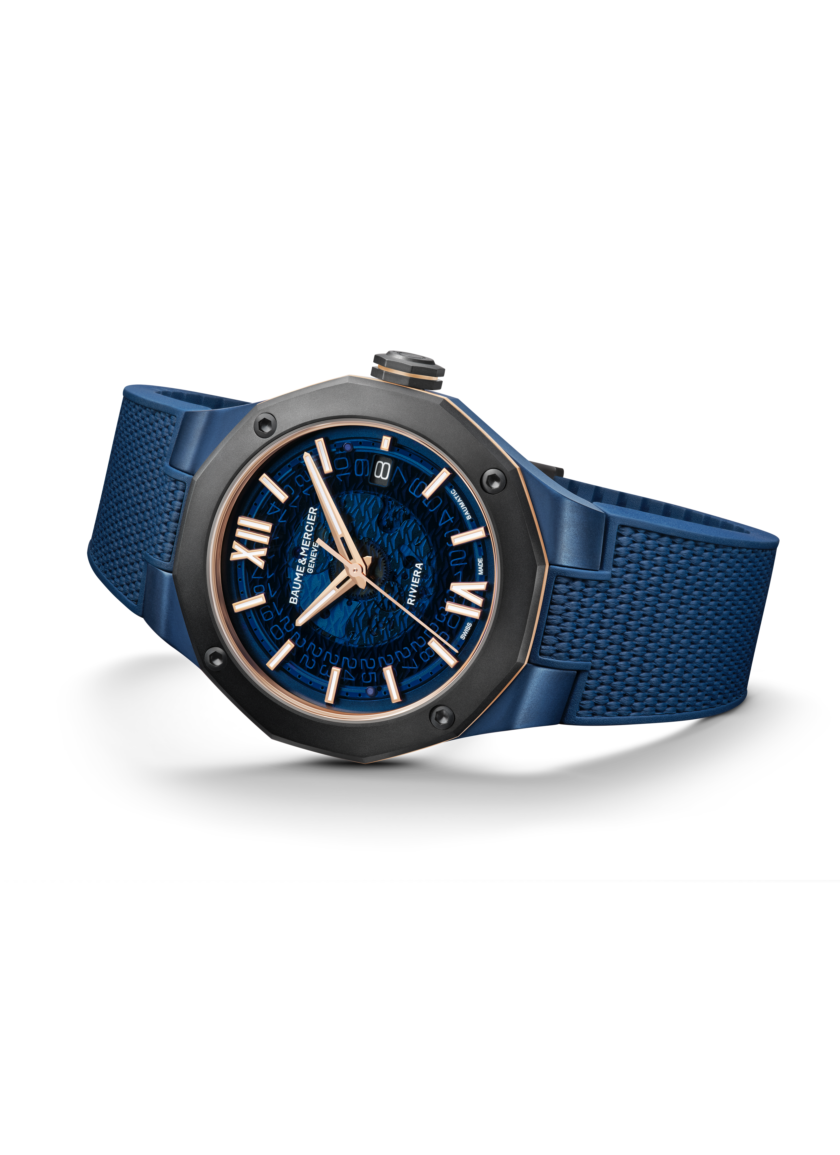 Eine blaue Uhr mit einem auffälligen Zifferblatt und einem strukturierten Armband. Die Uhr hat goldfarbene Zeiger und römische Ziffern.